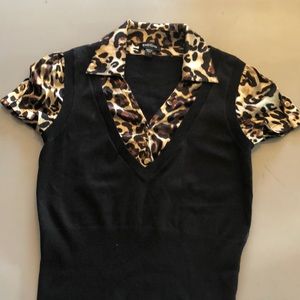 Bebe short sleeve top with animal print.